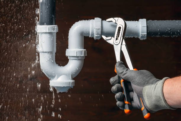 Professional Plumbing technician working in Orange, CT